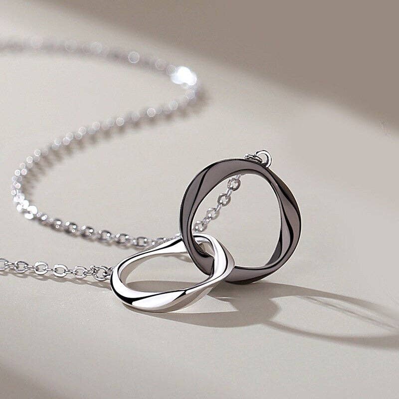 Interlocking Mobius Couple Necklace in 925 Sterling Silver