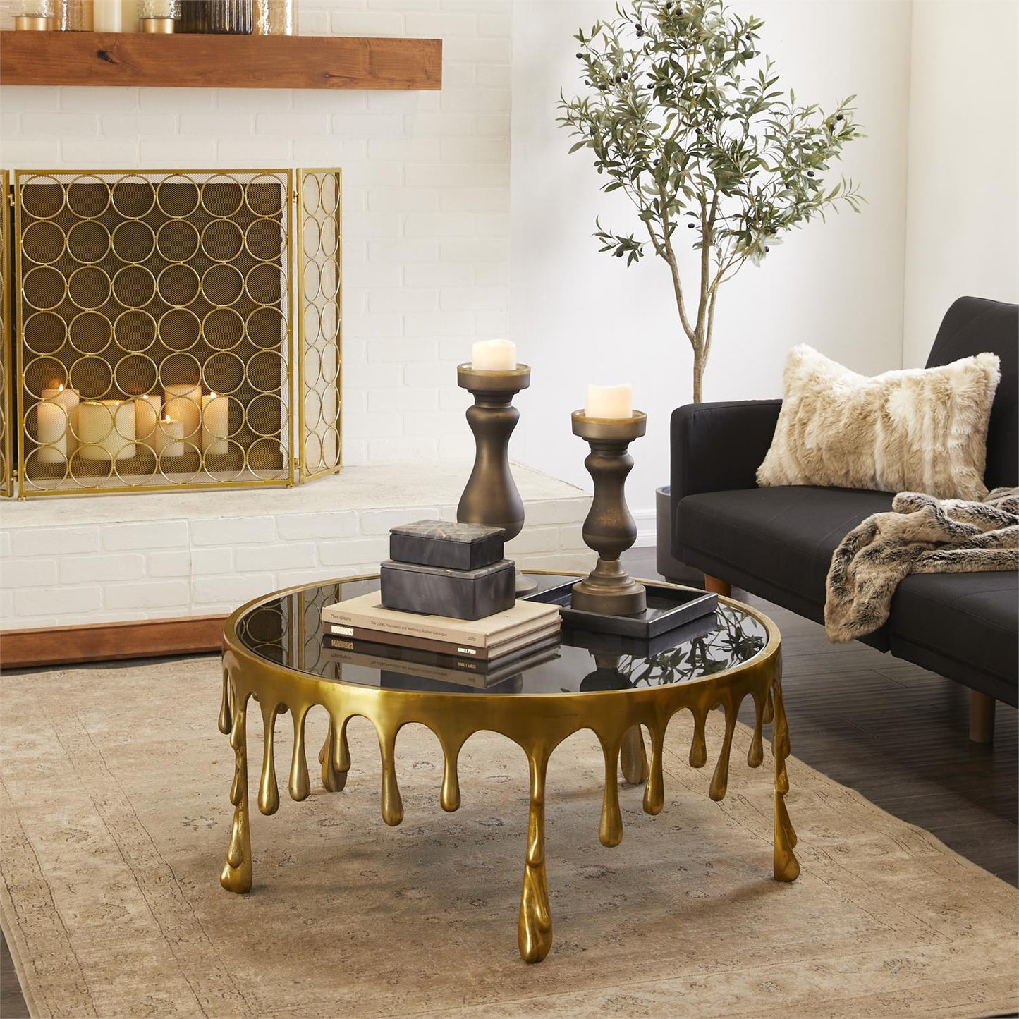 GOLD ALUMINUM METAL DRIP COFFEE TABLE WITH MELTING DESIGNED LEGS AND SHADED GLASS TOP